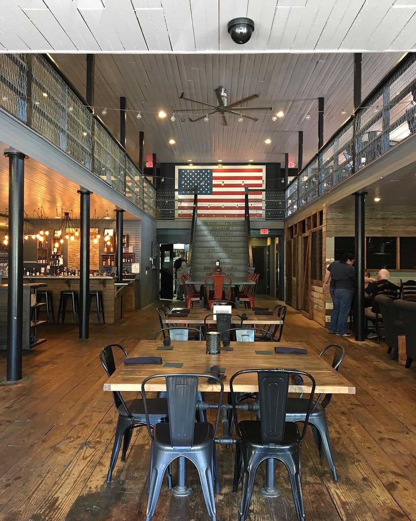 Halifax County keeps is patriotic throughout the year. There's just something special about the stars and stripes and the listing of the 13 original colonies up the steps at TheHenAndTheHogNC. (📷: brentalanjames) #DiscoverHalifaxNC #VisitNC