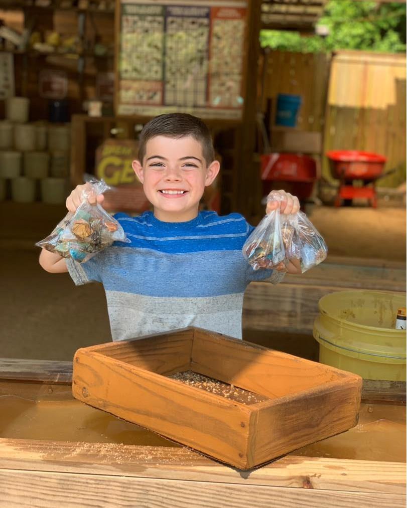 Unearth hidden treasure with a stop at family-focused gold and gem panning hot spots: @dukes_creek_mines  and the @outpost_gold_and_gem_. 

#goldpanning #familyfun #northga #helenga