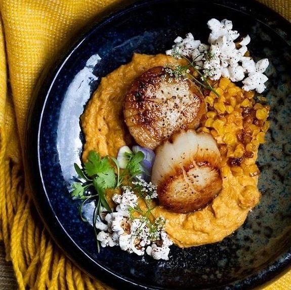 Scallops, bright, flavorful, delicious. ✨ The @bluejaybistro is open! Chef Ashleigh Fleming is bringing modern American flair to Downtown Littleton, NC! Make reservations for Wed/Thur (5-9pm), Fri/Sat (4-11pm). 
📸: @bluejaybistro
#DiscoverHalifaxNC #VisitNC