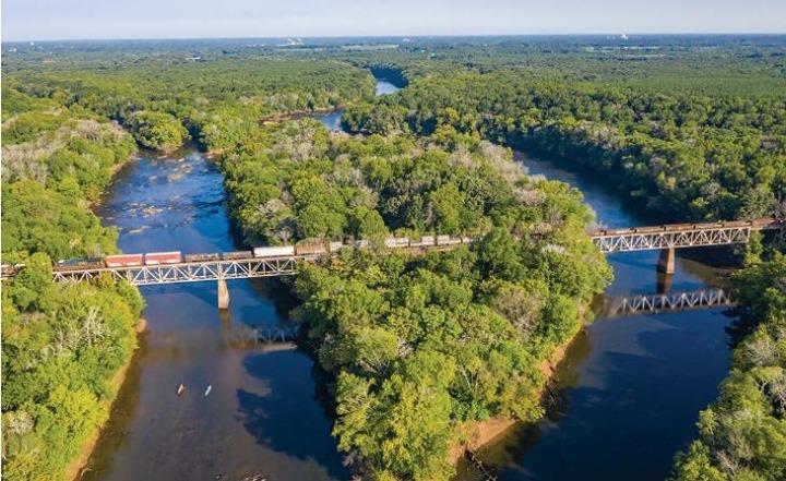 Paddle through the rapids as you pass beneath history. 
The Wilmington & Weldon Railroad was the longest in the world when it opened in 1840.
.
.
📸: Emily Chaplin and Chris Council/Our State Magazine
#DiscoverHalifaxNC #VisitNC #LoveNC #northcarolinaphotography #ExploreNC