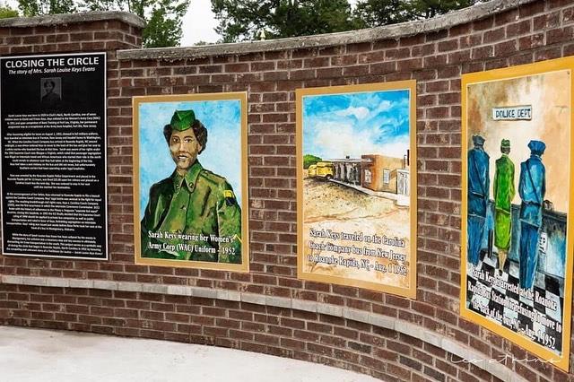 #TriviaTuesday This mural in Roanoke Rapids features a portrait of Sarah Keyes Evans, a civil rights pioneer. In 1952, Evans, a private in the Black Women’s Army Corps, refused to give up her seat on an interstate bus for a white Marine. She received a fine for disorderly conduct. And responded by filing a complaint that eventually lead to the Interstate Commerce Commission ruling that prohibited segregation on interstate buses. Who is the mural artist?
Hint: His murals are found all over Halifax County. (See link in bio.) 
#DiscoverHalifaxNC #VisitNC #SarahKeyesEvans