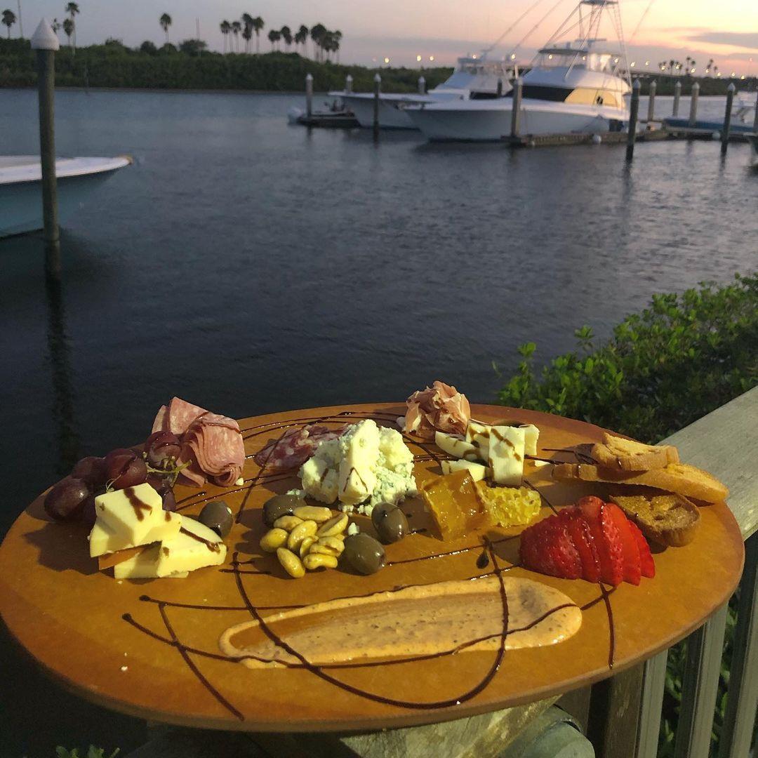 New menu item to try at Outriggers Tiki Bar and Grille: charcuterie board served with our chef’s choice of assorted meats, cheeses, local raw honey, and other goodies. 😋 😋 
#LoveNSB #LoveFL
📸: @outriggerstikibarandgrille