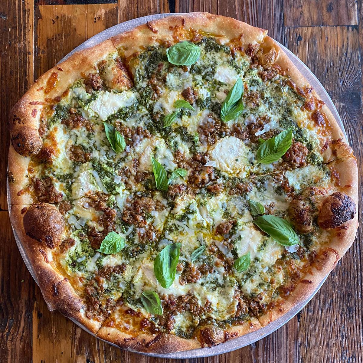 🌿White Pie
House Sausage
Arugula Pesto
Fresh Basil

Open @ 11
Happy hour 3-5
Half off rosé bottles for ladies til 9