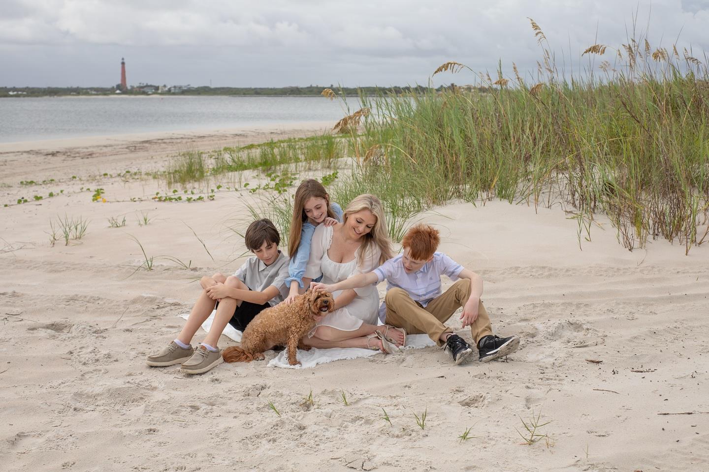 🐾🌊 Family, sunshine, and sandy paws—what more could you ask for? 💛 Capturing these sweet moments at Smyrna Dunes Park was pure magic! If you’re looking for a New Smyrna Beach photographer to document your family’s beachside memories (furry friends included!), let’s make it happen! 📸✨ #NewSmyrnaBeachPhotographer #BeachFamilyPhotos #SmyrnaDunesPark #FloridaPhotography