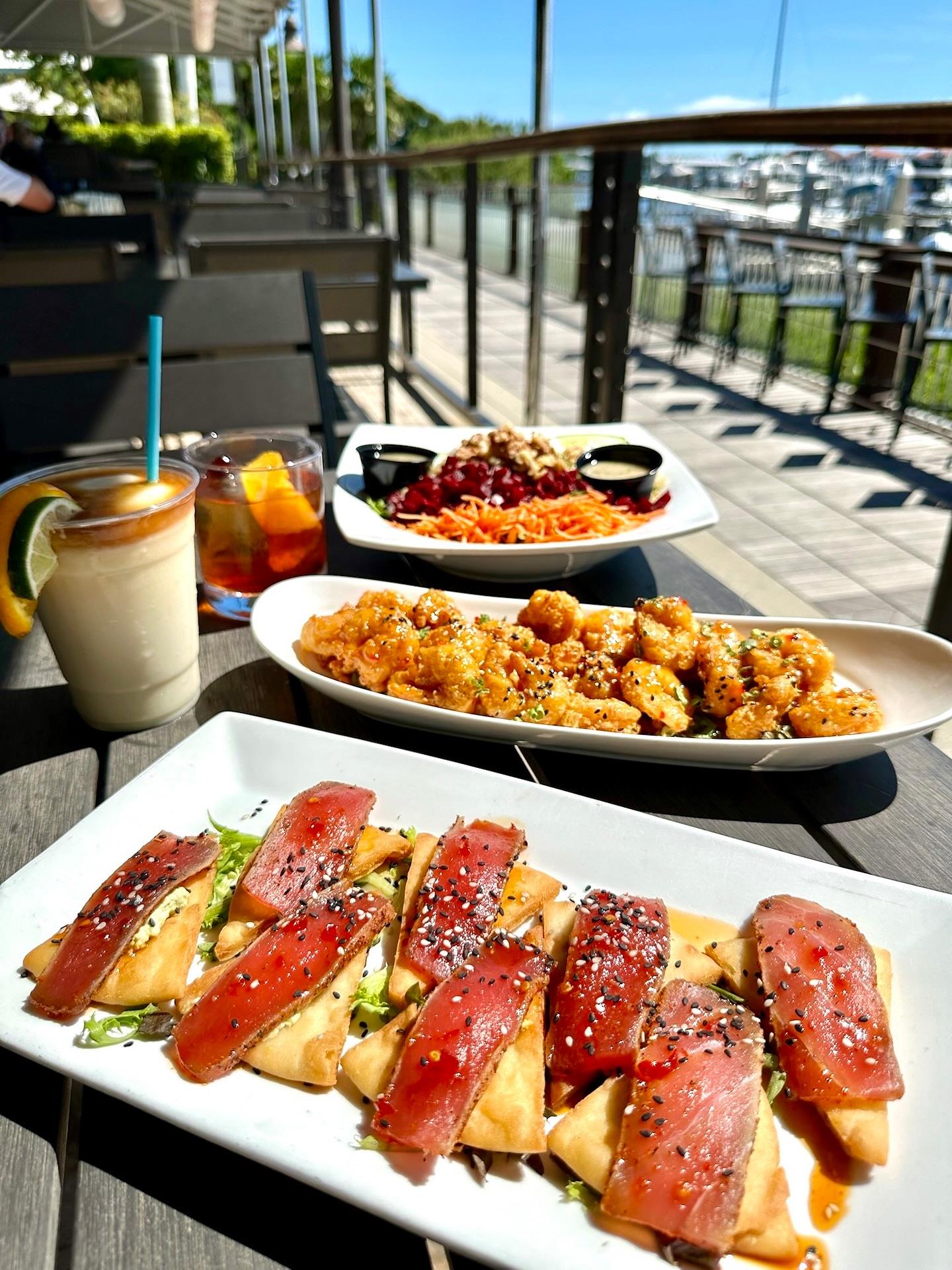 The perfect lunch order: Bangin’ Shrimp, Tuna Triangles, and a Goat Cheese Beet Salad! Whether you’re just visiting NSB or a local, we’ve got the perfect patio spot waiting for you with sunshine, good vibes, and even better views!🍹 

#outriggerstikibarandgrille #newsmyrnabeach #newsmyrnaeats #nsbeats #visitnsb #travelnsb #lovensb #nsb visitnewsmyrnabeach