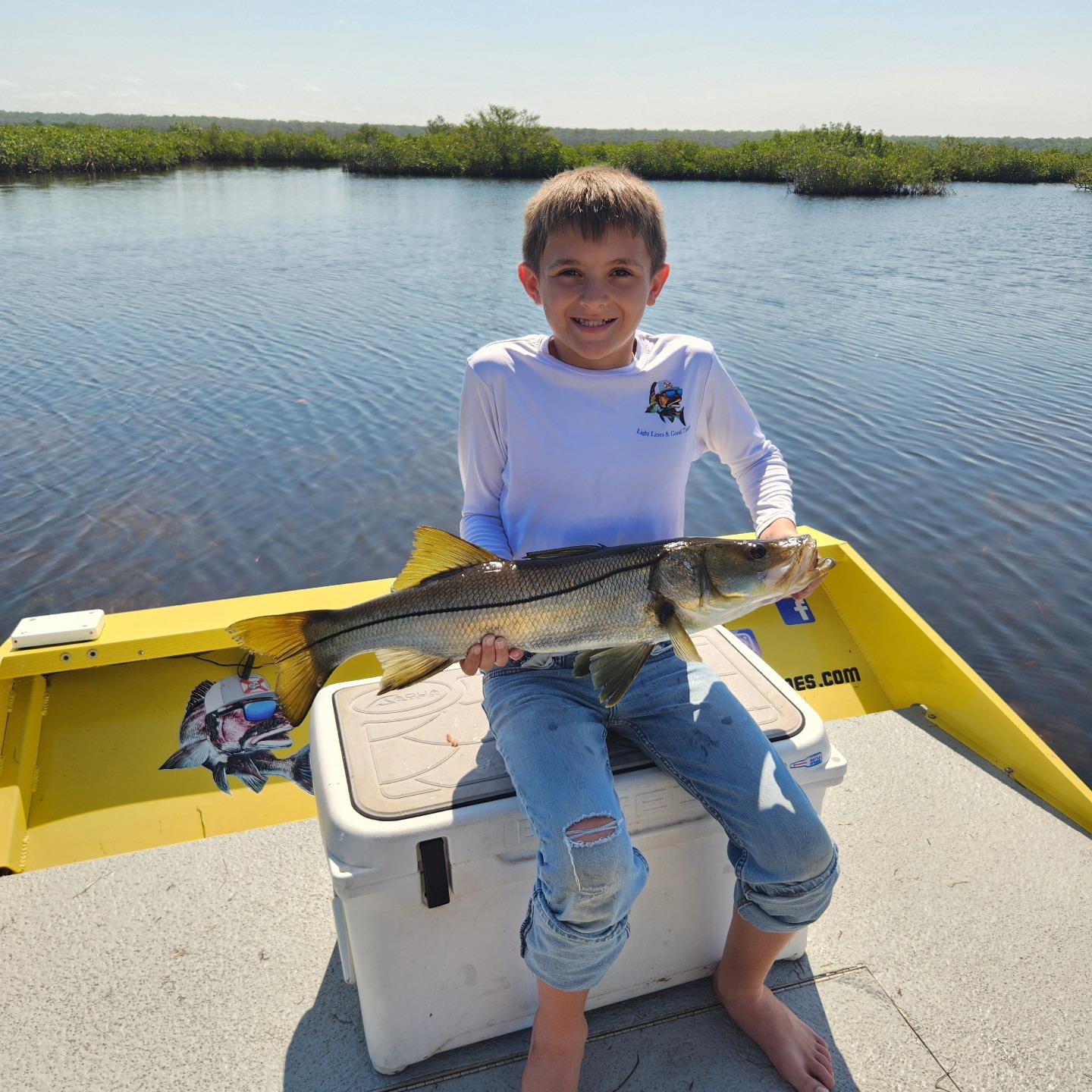 JR wanted to go fishing for his birthday, so that's what we did today. Got himself a nice snook.