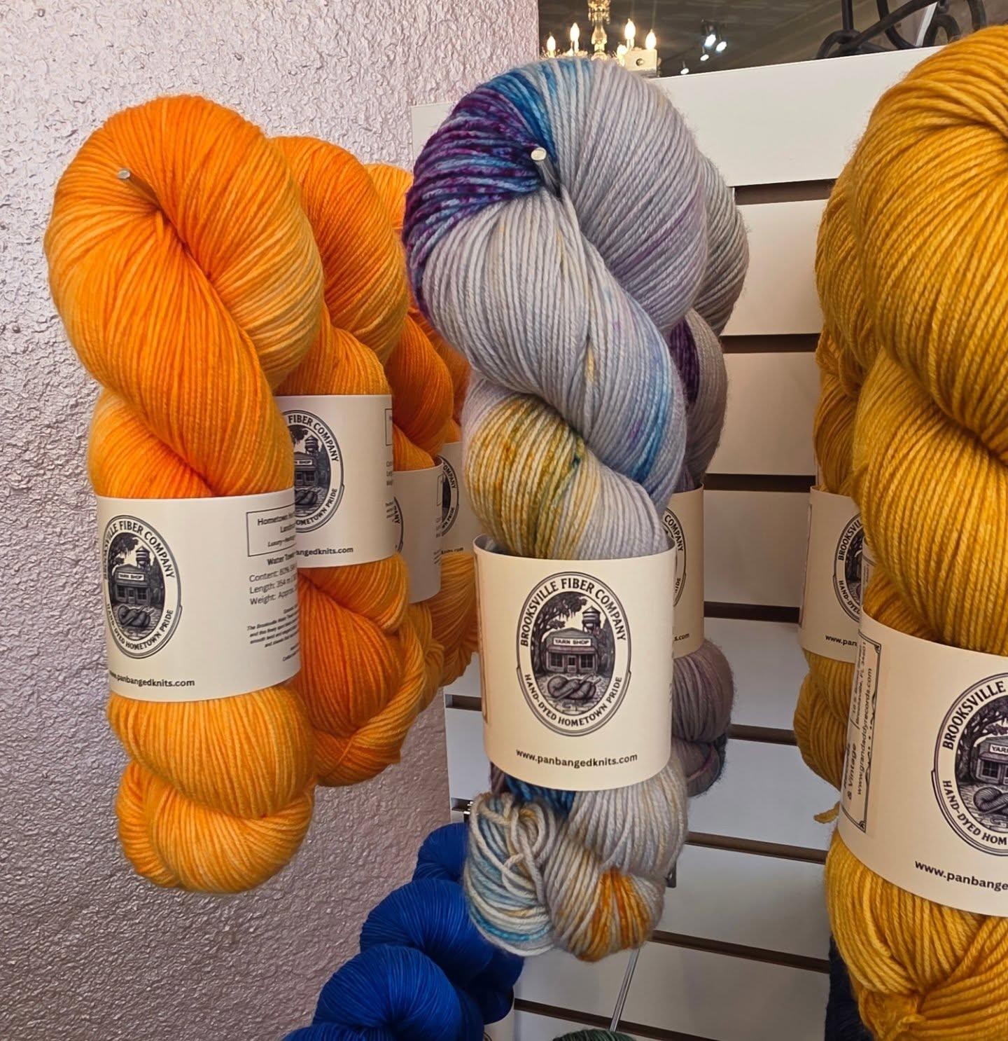 Did you know that panbangedknits has its very own fiber company—with a Landmark line where local Brooksville businesses each have their own custom color?

Citrus and Sage Bookshop’s shade is absolutely stunning. It reminds me of classic book spines lined up on a bookshelf.

There are so many gorgeous colors in the collection. Go visit our friends at Panbanged and explore them all!