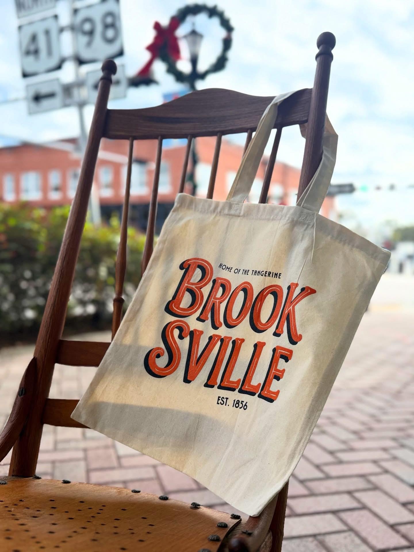 Today's the Tangerine Festival in downtown Brooksville and we'd love to see you stop by and enjoy the fun! 🧡🍊 We've got these lovely totes in store if you'd like to show off you BVL Pride! 

It's a beautiful day, so come on out and enjoy the festivities by brooksvillemainstreetfl sponsored by lowmanlawfirm.