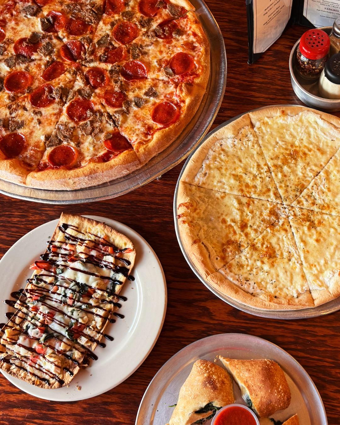 This is what “we’re eating good tonight” looks like. Family-style feasts, Italian-style flavors. All that’s missing is you. 🫶 

•••••••••••

#cheesepizza #flatbread #sausageandpepperonipizza #pizzatime #brooksvillefl #foodiefaves #pizzavilla352 #pizzavibes #brooksvilleflorida #springhillflorida #eatlocalflorida #floridalife #brooksvilleeats